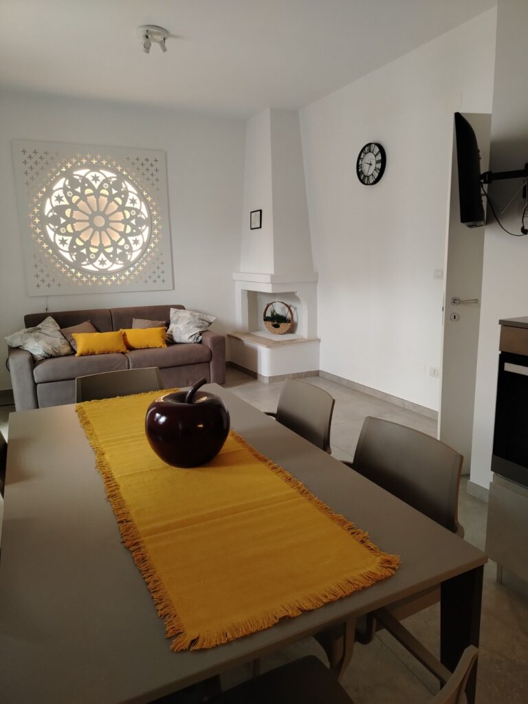 Zona living Dimora Kai.Ros – comfort e design a Baia verde